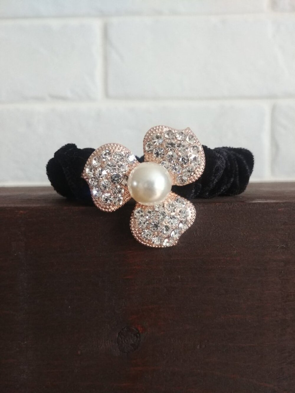 Black velvet hair scrunchie with large crystal gold tone faux pearl flower
